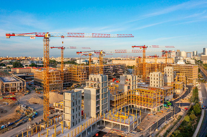 Ten Liebherr tower cranes are helping to build the largest timber campus in Europe